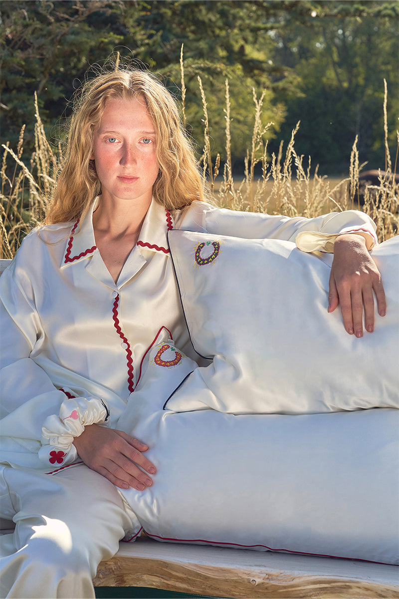 Pearl white loungewear pillowcase from Not Just Pajama with soft fabric and elegant design, ideal for comfortable sleep or relaxation.