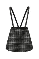 Nana Jacqueline Talia Tweed Mini Skirt in a stylish tweed fabric, shown on a model with a high waist and classic design.