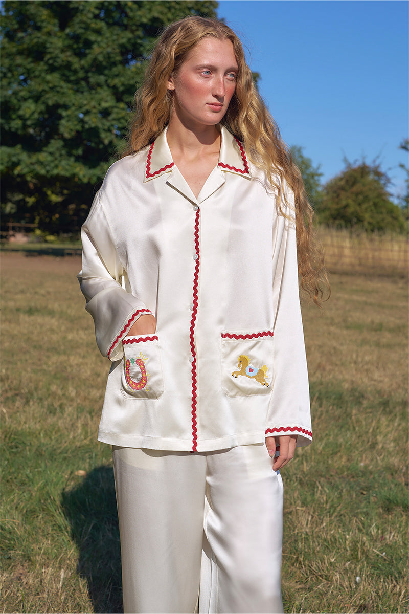 Pearl white contrast wave-trim long pajamas set by Not Just Pajama, featuring a comfortable design and stylish details.