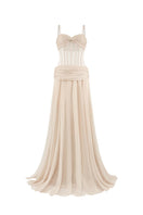 Long NUDE chiffon corset maxi dress by CEM, featuring an elegant, flowing design with intricate details and a fitted bodice.