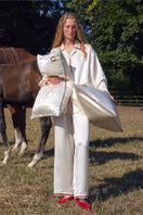 Pearl white loungewear pillowcase from Not Just Pajama, soft and comfortable fabric with a smooth finish.