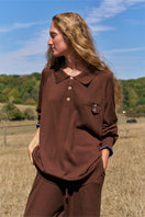 Unisex brown long sleeve knitwear shirt from Not Just Pajama, featuring a cozy, fitted knit fabric and classic collar.