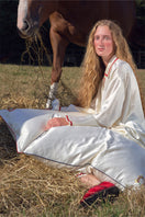 Pearl white loungewear pillowcase from Not Just Pajama, soft fabric with smooth texture for comfortable sleep and relaxation.