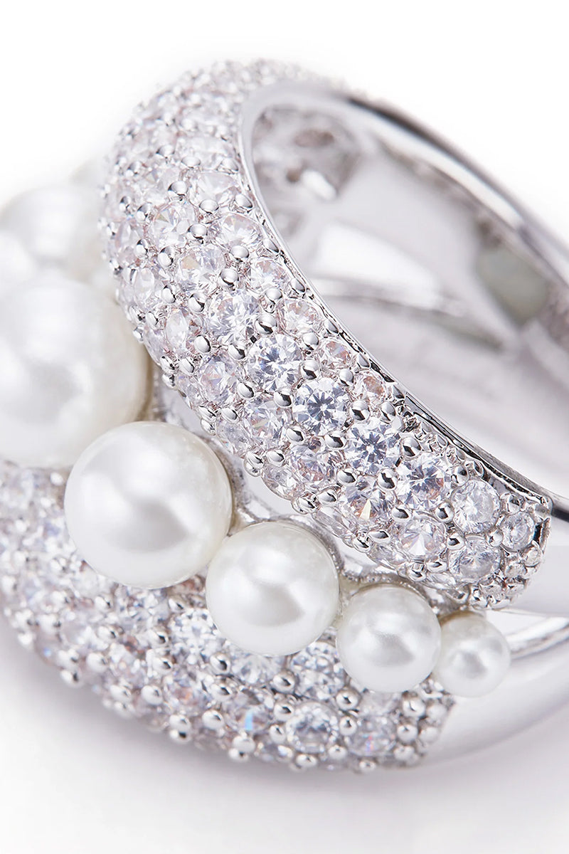 Silver Talia Ring by Nana Jacqueline featuring intricate design and polished finish, displayed on a neutral background.