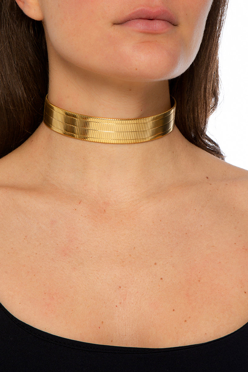 Gold choker necklace from Silvia Gnecchi's Alisee collection, featuring a sleek, minimalist design with a smooth finish.