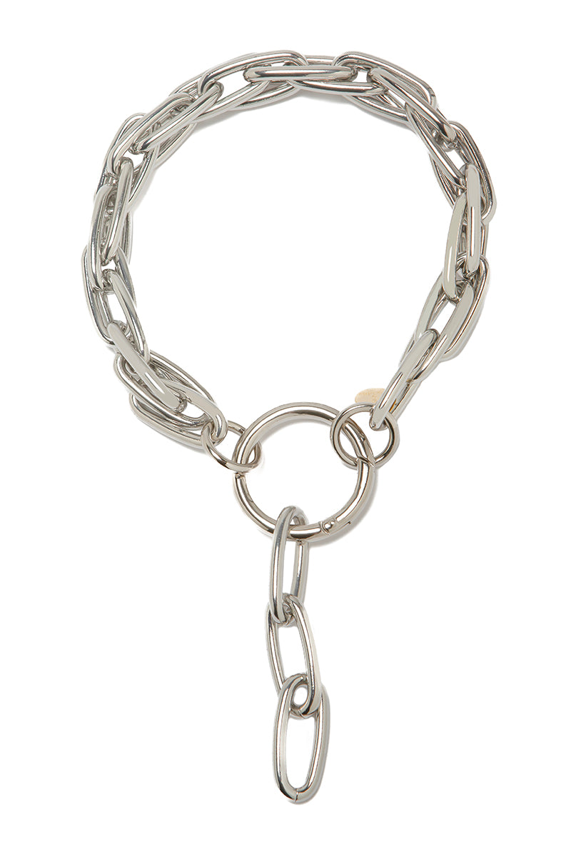 Silver Romina necklace by Silvia Gnecchi featuring delicate chain and elegant pendant, displayed against a neutral background.