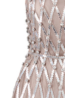 Cream sheer halter neck mesh mini dress by CEM featuring embellishments and a fitted silhouette.