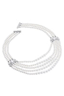 Elegant Maxine Necklace by Nana Jacqueline featuring intricate silver chain design and delicate pendant on a neutral background.
