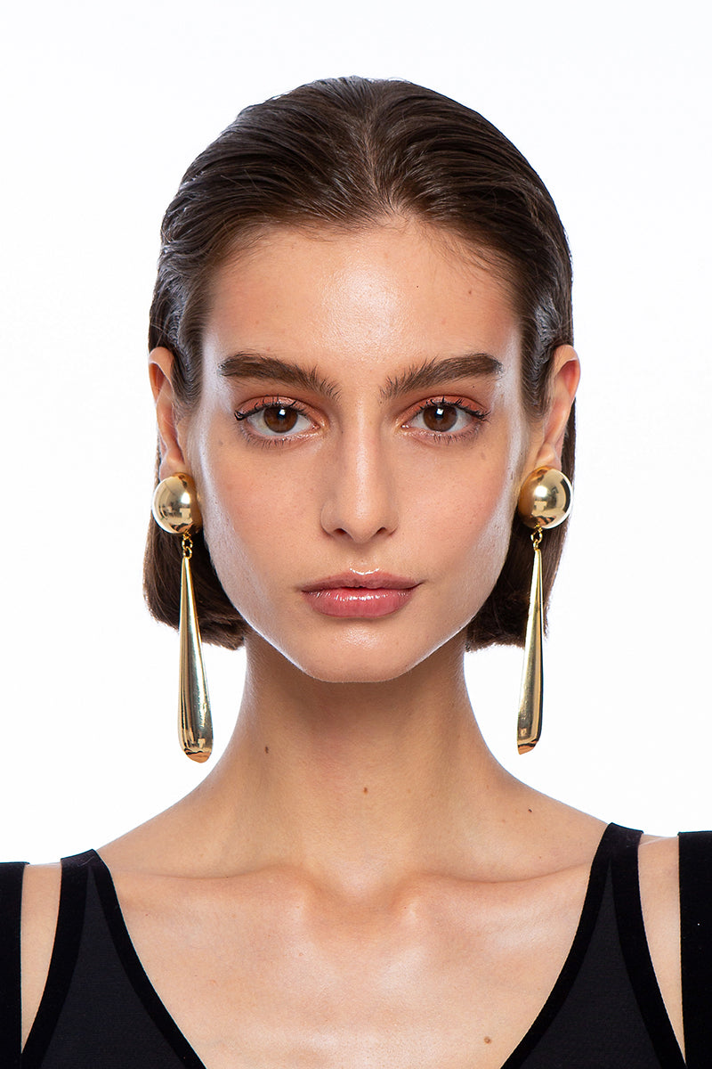 Silvia Gnecchi DROP GOLD EARRING showcasing sleek gold earrings with elegant drop design, on a plain background.