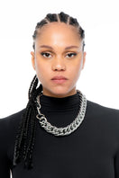 Silver Mariana necklace by Silvia Gnecchi featuring a delicate chain and elegant pendant displayed on a neutral background.