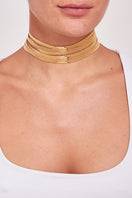 Small Imperial gold necklace by Silvia Gnecchi featuring delicate chain and elegant design, shown on a neutral background.