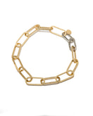 Gold Farah necklace by Silvia Gnecchi featuring a delicate chain and elegant pendant, displayed against a neutral background.