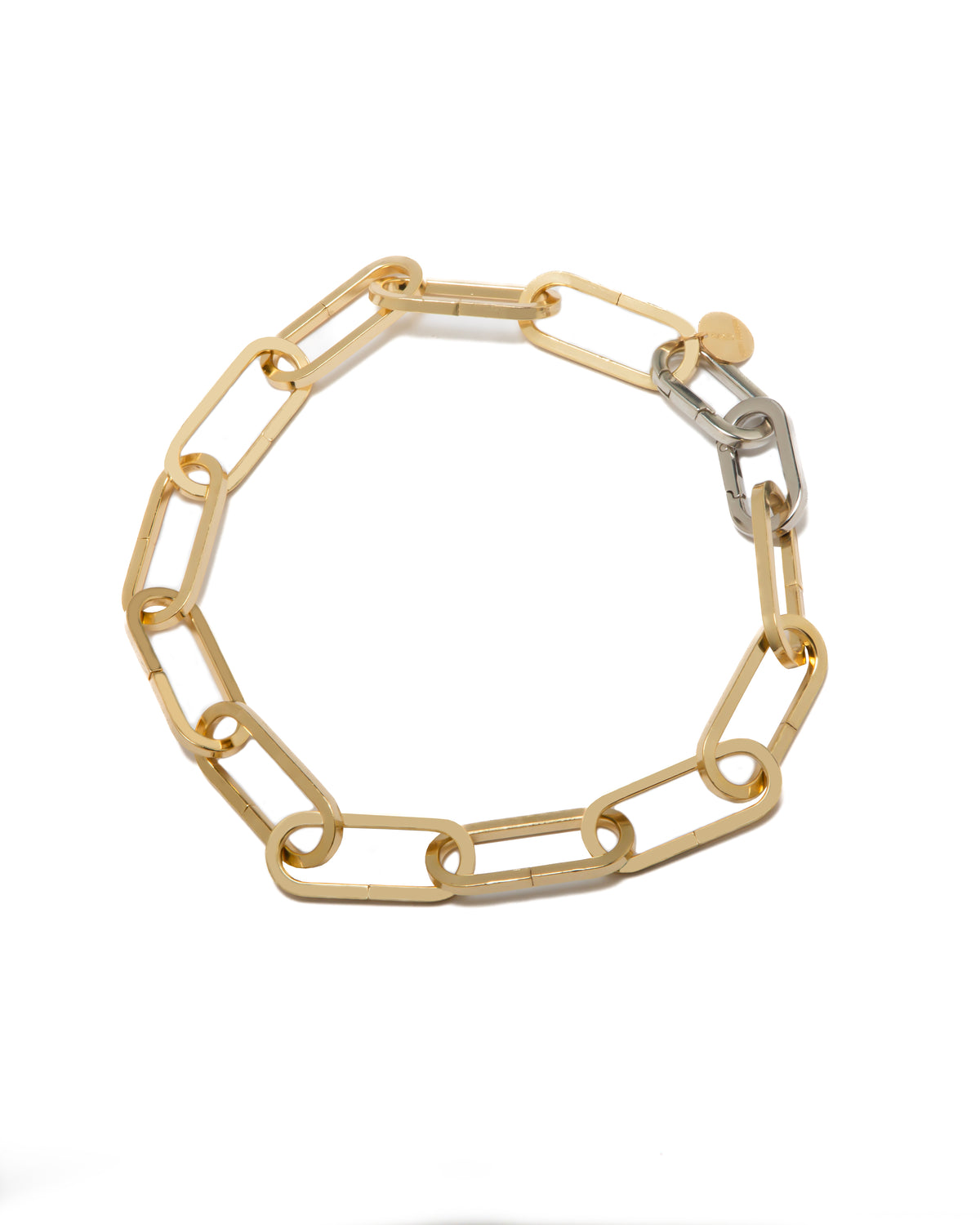 Gold Farah necklace by Silvia Gnecchi featuring a delicate chain and elegant pendant, displayed against a neutral background.