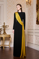 Black round neckline gown with one-shoulder fringe design made of silk by I.H.F, elegant evening wear with flowing fabric.
