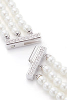 Gold MAXINE NECKLACE by Nana Jacqueline featuring a delicate chain and elegant pendant, perfect for stylish accessorizing.