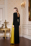 Black round neckline gown with one-shoulder fringe silk design by I.H.F, elegant evening dress with flowing fabric.