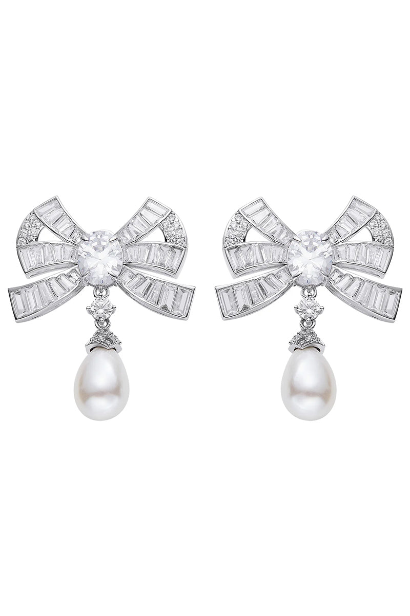 Evelyn earrings by Nana Jacqueline featuring elegant gold-toned earrings with intricate detailing and a stylish design.