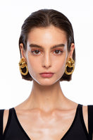 Silvia Gnecchi GABY gold earrings, stylish and elegant earrings with a polished gold finish, displayed against a neutral background.