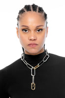 Silver "The Thing" necklace by Silvia Gnecchi featuring a sleek, modern design with a polished finish on a delicate chain.