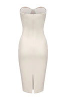 White Nana Jacqueline Elsa lace midi dress displayed on a hanger with intricate lace details and a flowing silhouette.