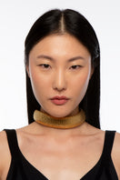 Gold serpent necklace by Silvia Gnecchi featuring a detailed snake chain and elegant design, perfect for stylish jewelry.