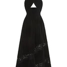 Nana Jacqueline Maxine velvet gown with long sleeves and elegant design, showcased on a model against a neutral background.