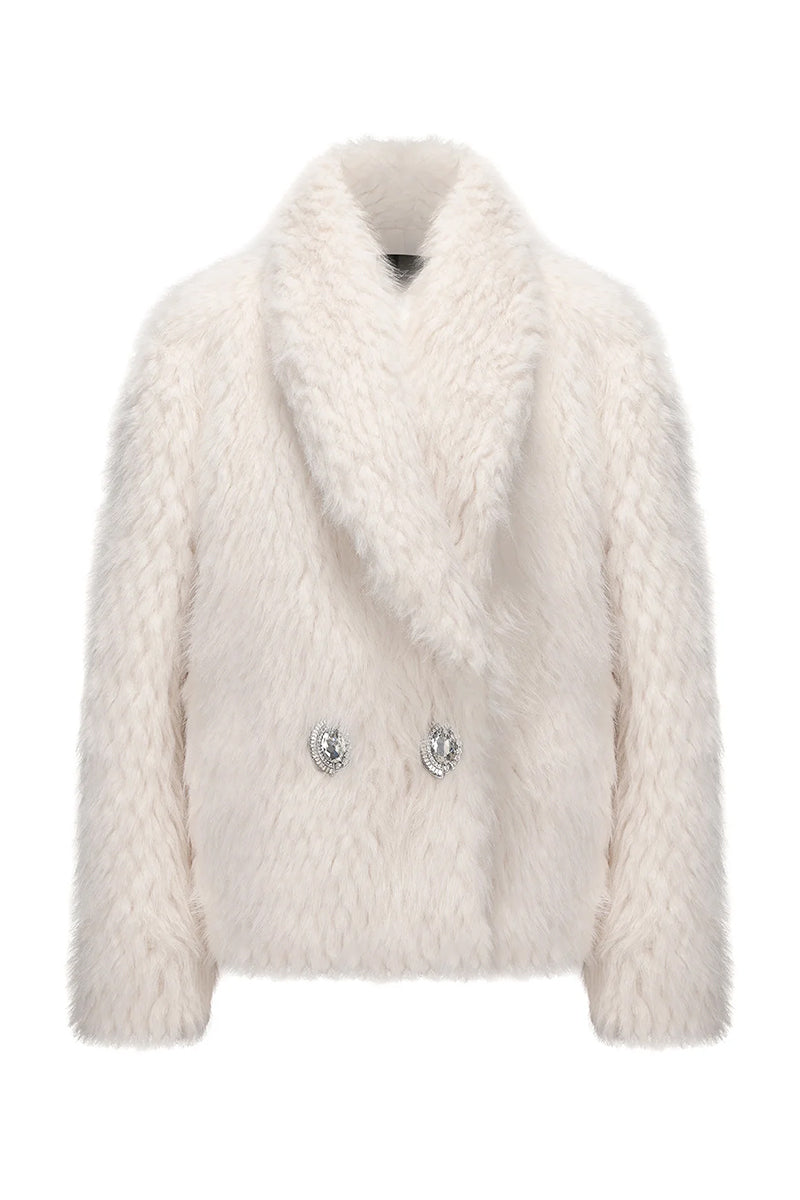 Nana Jacqueline Alyssa fur coat displayed on a hanger, showcasing plush beige fur and elegant design for winter fashion.