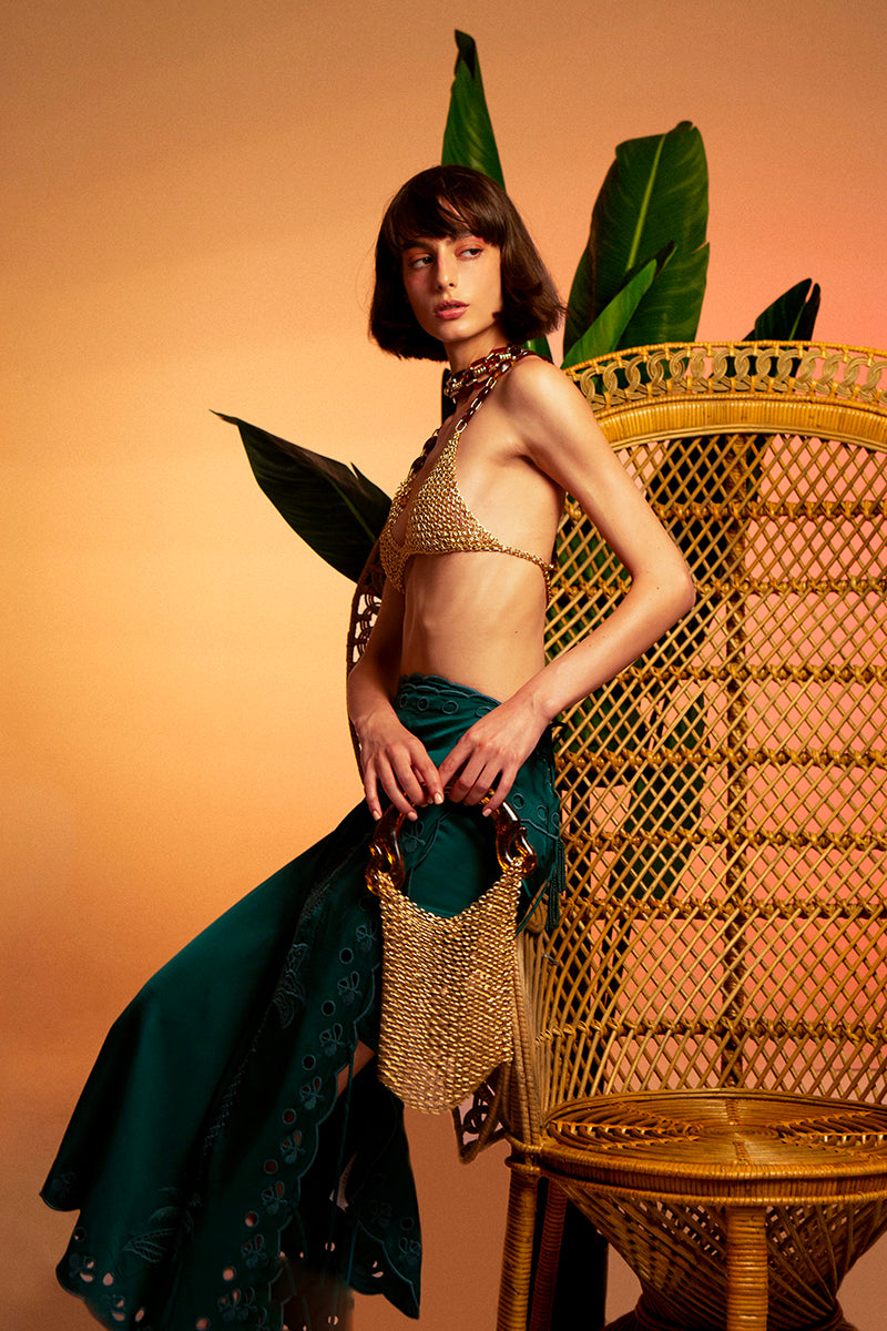 Silvia Gnecchi caramel gold bra top with delicate straps and smooth fabric, designed for stylish and comfortable wear.