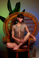 Silver and gold chain vest from Silvia Gnecchi's LOULOU collection, worn as a stylish top with layered chain details.