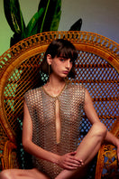 Silver and gold chain vest top by Silvia Gnecchi, featuring layered metallic chains and a stylish, modern design.
