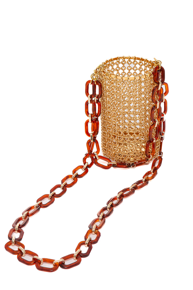 Silvia Gnecchi caramel chain bucket bag with top handle and stylish design, featuring a textured leather surface and gold-tone hardware.