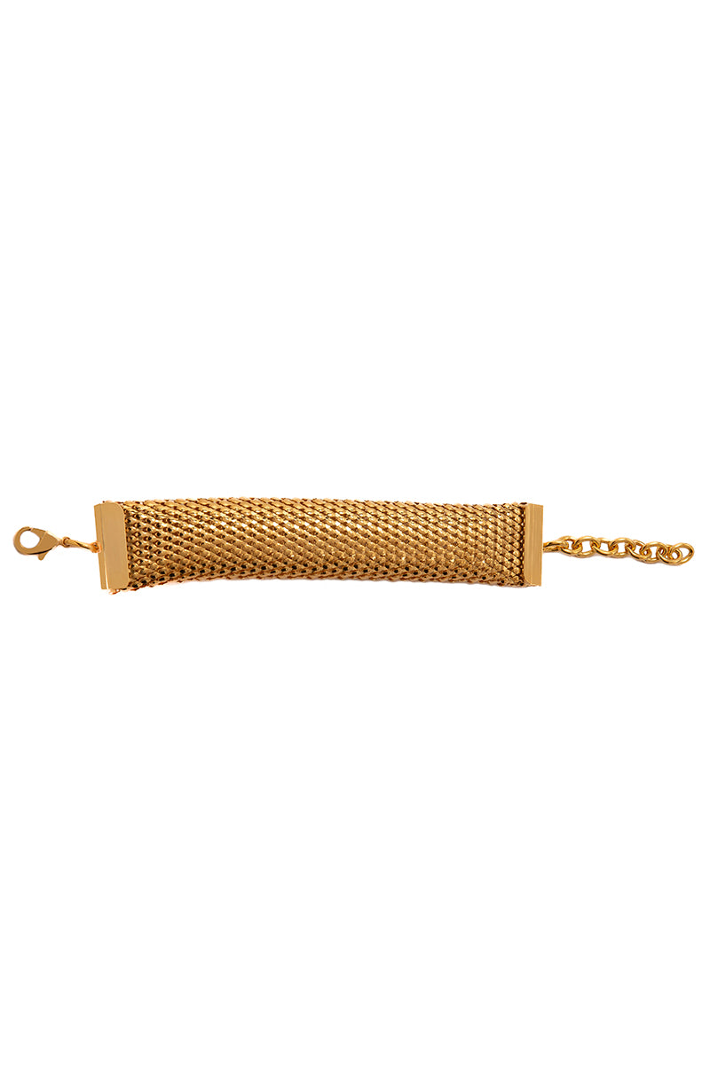 Gold bracelet from Silvia Gnecchi's Serpent collection featuring intricate serpent design and polished finish.