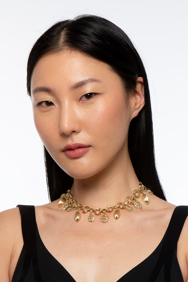 Gold choker necklace from Silvia Gnecchi's LEON collection, featuring a sleek, modern design with a smooth finish.