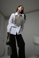 Silver Sofia top by Silvia Gnecchi, stylish sleeveless blouse with elegant fabric and modern design, perfect for chic outfits.