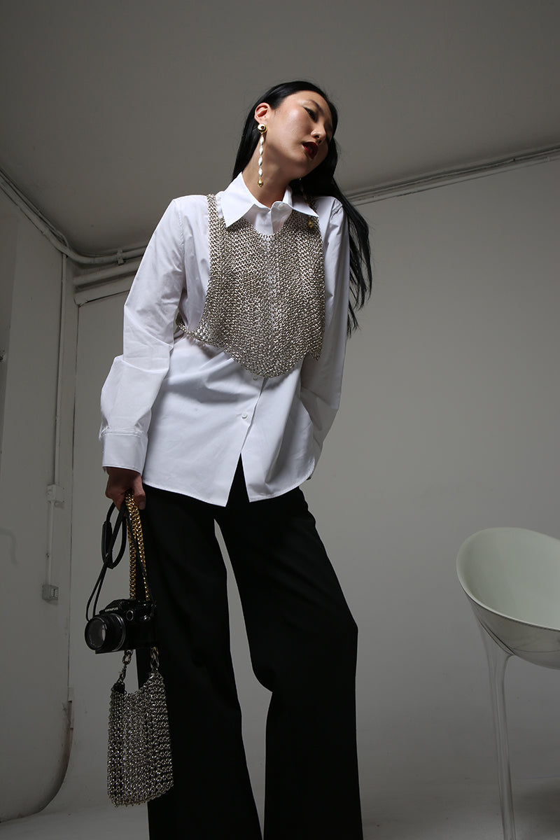 Silver Sofia top by Silvia Gnecchi, stylish sleeveless blouse with elegant fabric and modern design, perfect for chic outfits.