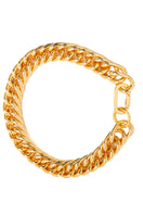 Gold Mariana necklace by Silvia Gnecchi featuring delicate chain and pendant, styled on a neutral background.