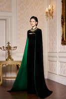 Black strapless velvet gown with long cape from I.H.F, elegant evening dress featuring a fitted bodice and flowing cape.