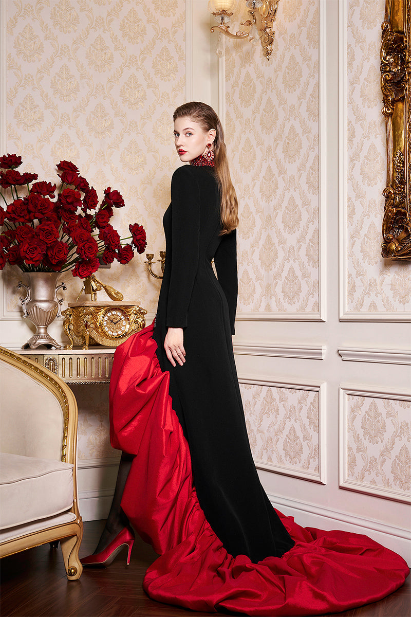 Elegant high neckline gown with draped taffeta hem by I.H.F, featuring flowing fabric and sophisticated design.