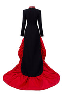 Elegant I.H.F gown featuring a high neckline and draped taffeta hem, showcased in a formal evening wear style.