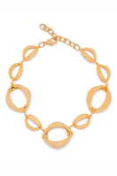 Gold Bouche necklace by Silvia Gnecchi featuring a delicate chain and elegant pendant, displayed on a neutral background.