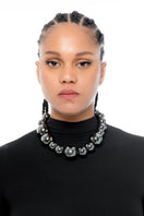 Silver Yaba necklace by Silvia Gnecchi featuring a delicate chain and unique pendant design.