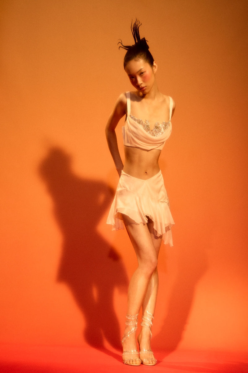 IKINITA Sakura top and skirt set, stylish co-ords with floral design, featuring a matching blouse and skirt ensemble.