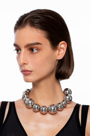 Silver YABA Necklace by Silvia Gnecchi featuring a sleek, modern design with delicate chain and minimalist pendant.