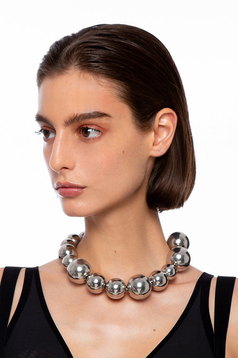 Silver YABA Necklace by Silvia Gnecchi featuring a sleek, modern design with delicate chain and minimalist pendant.