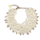 Silver necklace with pearls by Silvia Gnecchi, featuring elegant pearl and silver bead design, displayed on a neutral background.