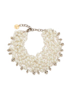 Silver necklace with pearls by Silvia Gnecchi, featuring elegant pearl and silver bead design, displayed on a neutral background.