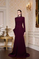I.H.F de-constructed collar gown with draped waist, elegant black fabric, flowing silhouette, and unique modern design.