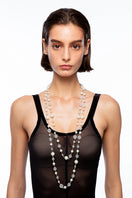 Silvia Gnecchi Aura Pearl Necklace featuring elegant white pearls on a delicate chain, perfect for sophisticated accessory.
