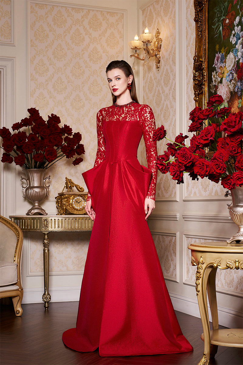 Red long sleeve gown with draped waist by I.H.F, featuring elegant flowing fabric and sophisticated design.