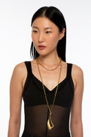 Gold necklace from Silvia Gnecchi's VELA collection featuring a delicate chain and minimalist design.
